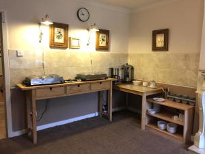 Kuchyň nebo kuchyňský kout v ubytování Distillery Guest House