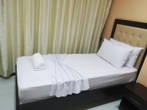 Una cama o camas en una habitación de Hotel Vjosa