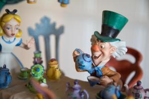 a toy figurine of a man in a top hat and a woman at Cheshire Cat Inn & Cottages in Santa Barbara