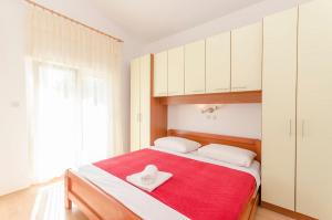 Posteľ alebo postele v izbe v ubytovaní Apartments Sklopina