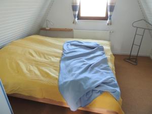 Ein Bett oder Betten in einem Zimmer der Unterkunft 50182 Achtern Freesenwall