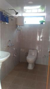 Koupelna v ubytování Yashita Homestay
