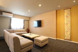 Televisyen dan/atau pusat hiburan di HOTEL COCON +17 gambar