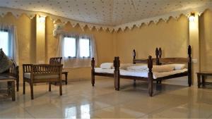 Postel nebo postele na pokoji v ubytování Prakriti Farms + 41 fotografií