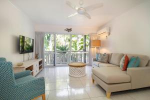 Posezení v ubytování The White House Port Douglas