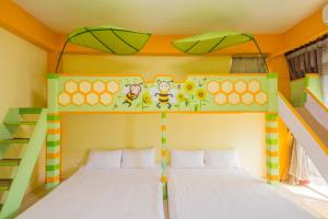 Postel nebo postele na pokoji v ubytování Moonlight Fengqing Homestay