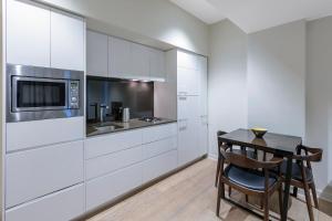 Kuchyň nebo kuchyňský kout v ubytování Wyndham Hotel Melbourne