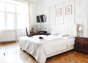 Posteľ alebo postele v izbe v ubytovaní Apartament City, Clock + 18 fotografií