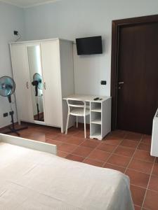 Łóżko lub łóżka w pokoju w obiekcie Agriturismo La Farazzina