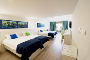 Postel nebo postele na pokoji v ubytování Hotel Santana