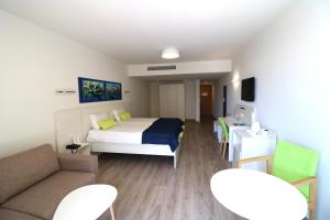 Postel nebo postele na pokoji v ubytování Hotel Santana