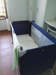 Łóżko lub łóżka w pokoju w obiekcie Agriturismo La Farazzina