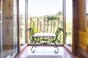 Balkón nebo terasa v ubytování Alzina Villa 5 bedrooms with pool in Sa Coma Bunyola at the foot of the Sierra de Tramuntana but close to Palma