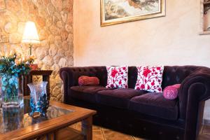 Posezení v ubytování Alzina Villa 5 bedrooms with pool in Sa Coma Bunyola at the foot of the Sierra de Tramuntana but close to Palma