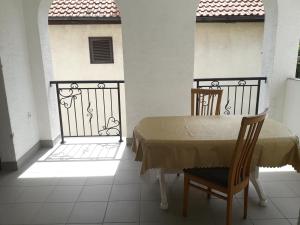 Un balcón o terraza en Apartmani Milivojevic