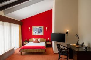 Letto o letti in una camera di Hetzel Hotel Stuttgart