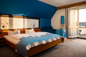 Letto o letti in una camera di Hetzel Hotel Stuttgart
