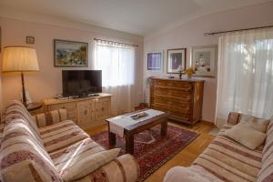 TV a/nebo společenská místnost v ubytování Casa Moreda Vodnjan