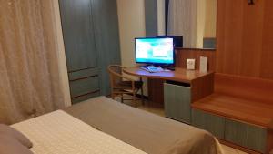 Voodi või voodid majutusasutuse Albergo Al Cacciatore toas