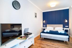 Łóżko lub łóżka w pokoju w obiekcie Apartment Zamojska 8 - Apartamenty GKM Lublin