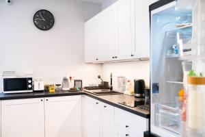 Kuchnia lub aneks kuchenny w obiekcie Apartment Zamojska 8 - Apartamenty GKM Lublin