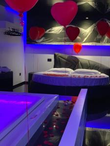 Voodi või voodid majutusasutuse Damore Suite toas