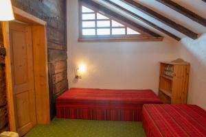 Rúm í herbergi á Bio-Hotel Saladina