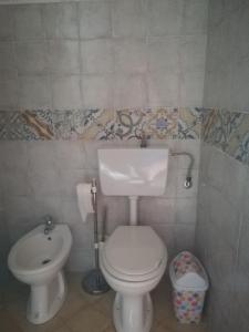 Un baño de Santina