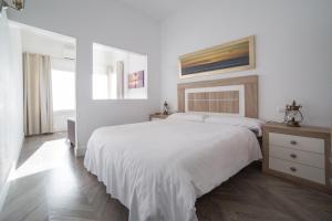 Postel nebo postele na pokoji v ubytování Hotel Boutique Milla de Plata