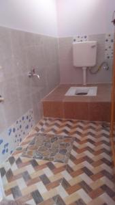 Koupelna v ubytování Yashita Homestay