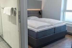 Letto o letti in una camera di Copenhagen Go Hotel
