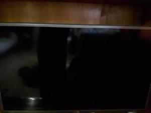 eine Schließung eines Fernsehbildschirms in einem Zimmer in der Unterkunft Киевская 43 in Khorol