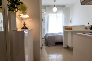 A bed or beds in a room at The Modern Suite