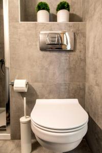 A bathroom at The Modern Suite