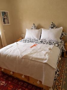 Postel nebo postele na pokoji v ubytování Riad Espressino exclusive Marrakech