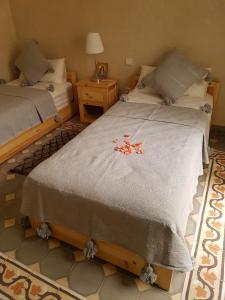 Postel nebo postele na pokoji v ubytování Riad Espressino exclusive Marrakech