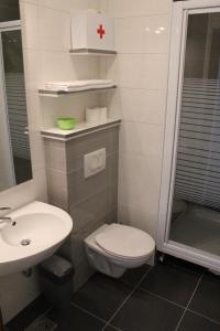 Koupelna v ubytování Apartments Adria