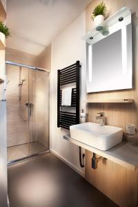 Kuchyňa alebo kuchynka v ubytovaní Apartmány Ladná