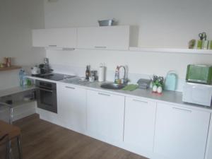 Kuchnia lub aneks kuchenny w obiekcie Baltic Beach View Porta Mare plaża