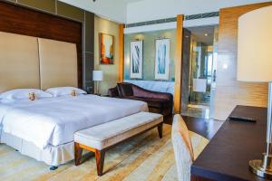 Voodi või voodid majutusasutuse Hyatt Regency Dongguan toas