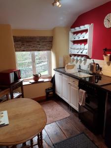 Una cocina o kitchenette en Loft Cottage