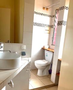 Phòng tắm tại Résidence Bertille Abidjan Cocody