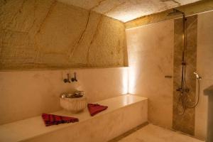 
A bathroom at Kayakapi Premium Caves Cappadocia
