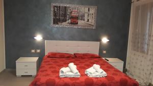 Postel nebo postele na pokoji v ubytování B&B Casa Taty