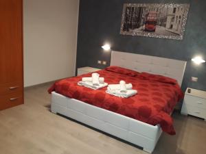 Postel nebo postele na pokoji v ubytování B&B Casa Taty