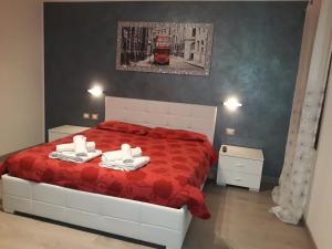 Postel nebo postele na pokoji v ubytování B&B Casa Taty