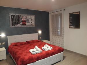 Postel nebo postele na pokoji v ubytování B&B Casa Taty