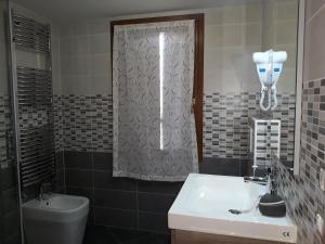 Koupelna v ubytování B&B Casa Taty