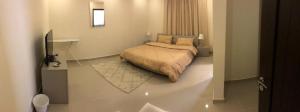 アル・キランにあるThe Diamonds (Families Only )の部屋にベッドがある寝室 +38枚の写真