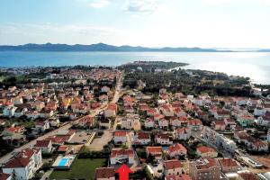 an aerial view of a town next to the water at Villa Mičić in Zadar